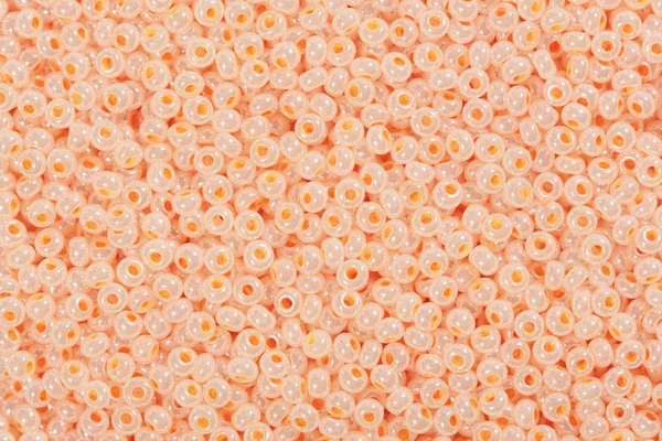 Coral seed beads.