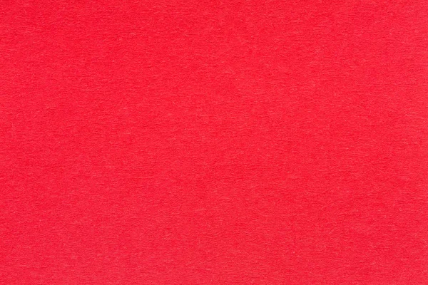 Fond rouge foncé avec une texture de papier doux . — Photo