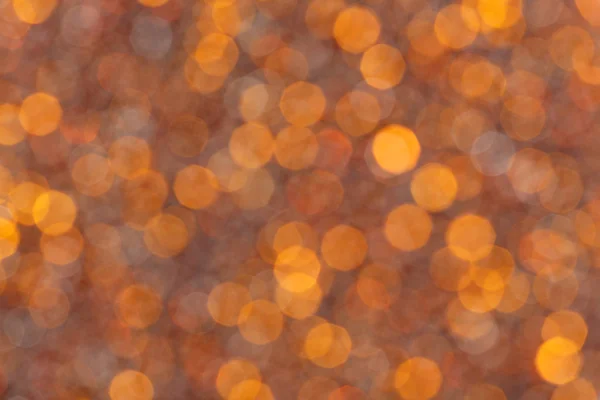 Tmavě oranžové pozadí abstraktní s částicemi. — Stock fotografie