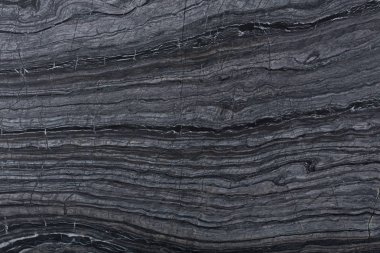 Koyu gri kayrak taşı arkaplan veya doku.