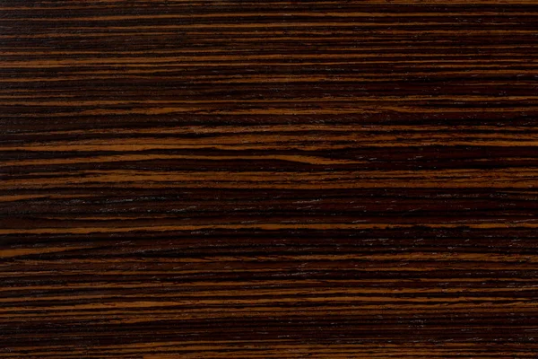 Dark ebony wood background, exclusive natural texture with patte