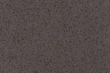 Sentetik kuvars taş doku, koyu gri tonu.