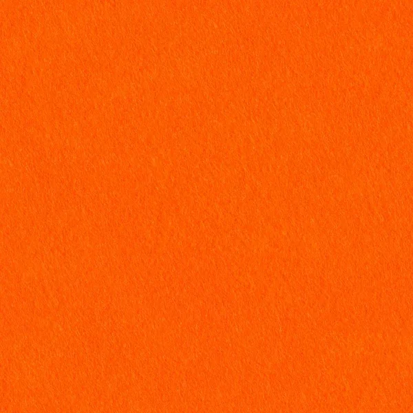 Orange felt background close-up. Seamless square texture, tile r