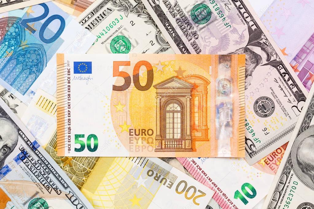 Many euro and dollar, close up.