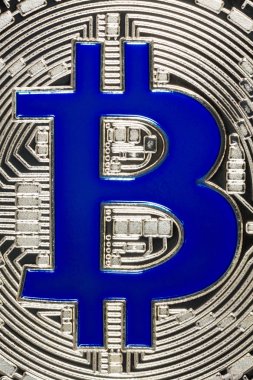 Bit-sikke öğe gri arka plan üzerinde.