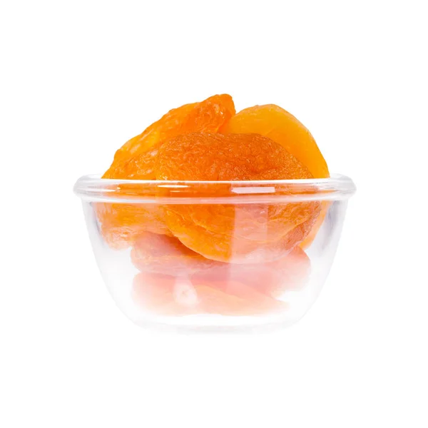 Dried delicious apricots in saucepan on white background. — Stock Photo, Image