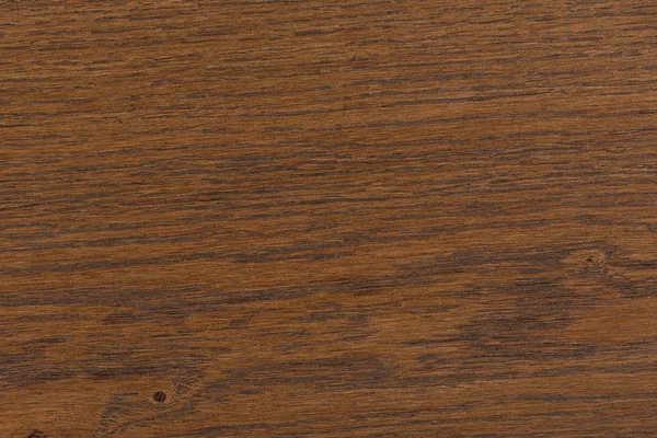 Fondo de una superficie de mesa de madera oscura con textura fina . — Foto de Stock