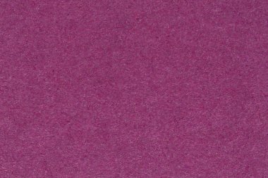 Engebeli buruşuk menekşe mor kağıt arka plan.