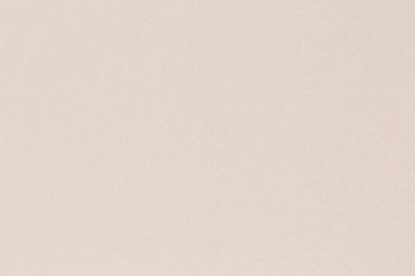 Kağıt dokusu arka plan açık krem rengi, makro çekim.