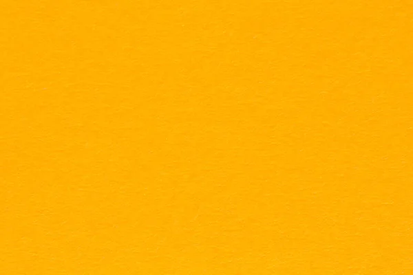 Texture de papier granuleux fond orange clair . — Photo