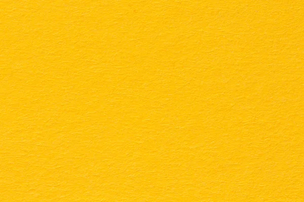 Fundo de papel amarelo, textura de papel colorido . — Fotografia de Stock