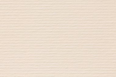 Doku arka plan ışık krem tonda kağıt, yakın çekim.