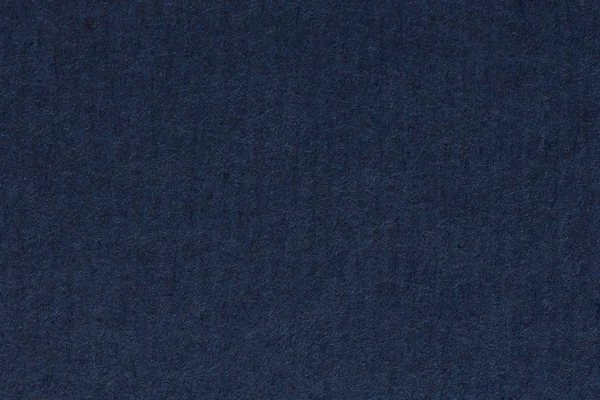 Dikey çizgiler ile koyu mavi kağıt arka plan.