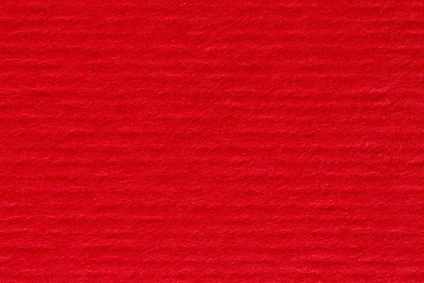 Parlak kırmızı soyulmuş kağıt arka plan. 