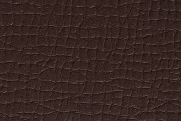 Kahverengi bir kaba doku arka planını yakın çekim.