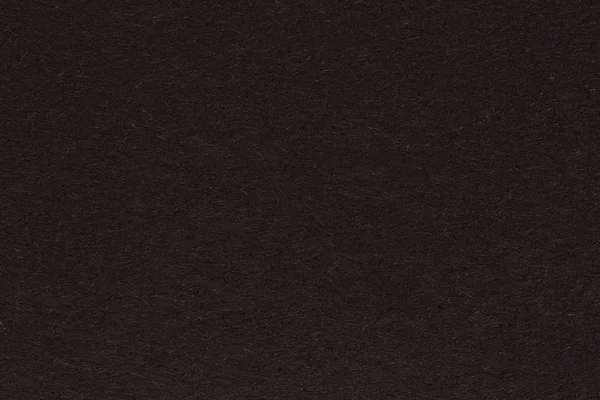 Siyah kağıt dokusu üzerinde makro.