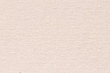 Hafif pembe kağıt dokusu yakın çekim. 