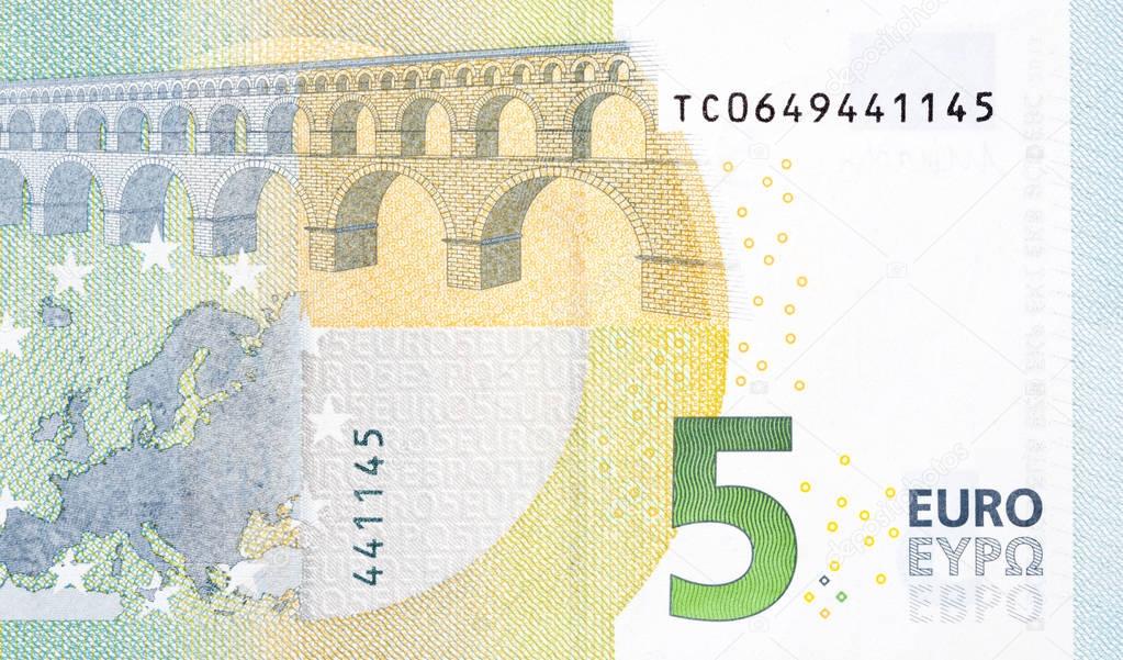 Photo of five euro banknote in macro.