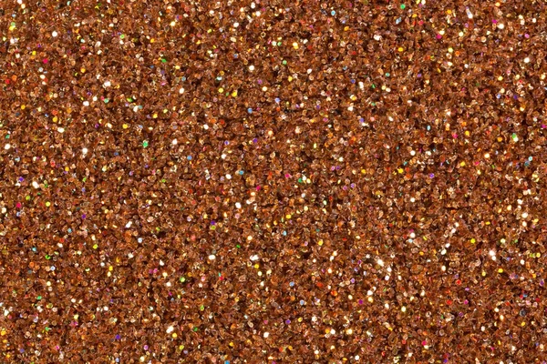 Light brown glitter background.