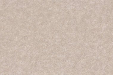 doğal elyaf parçaları ile grenli dokulu kağıt.