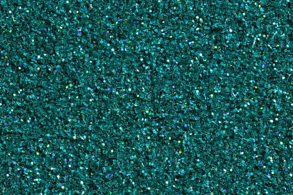 Contrast dark turquoise background with glitter.