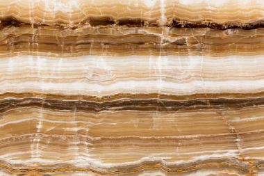 Bej renkli desenli onyx doğal taş backgorund.