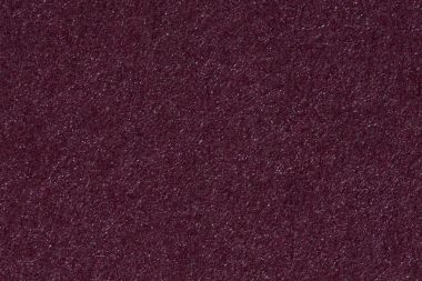 Mor renkli bir fırçalanmış kağıt yaprak dokusu.