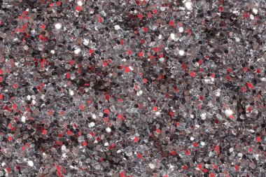 Parlak gri arka plan kırmızı payetler ile.