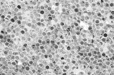 Parlak ışık ile karanlık payetler arka plan.