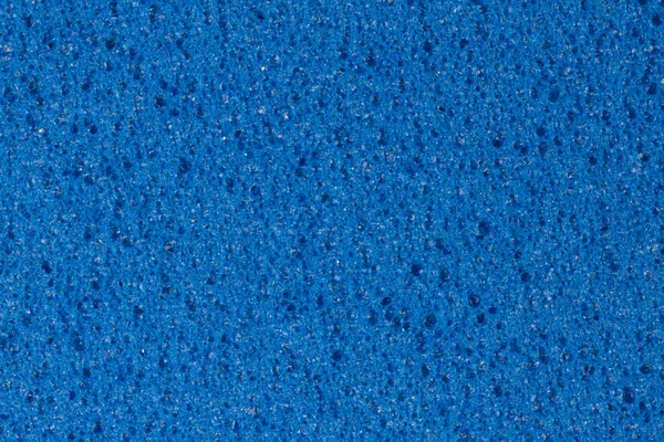 Textura de acetato de vinilo de etileno azul (espuma) con porosidad . — Foto de Stock