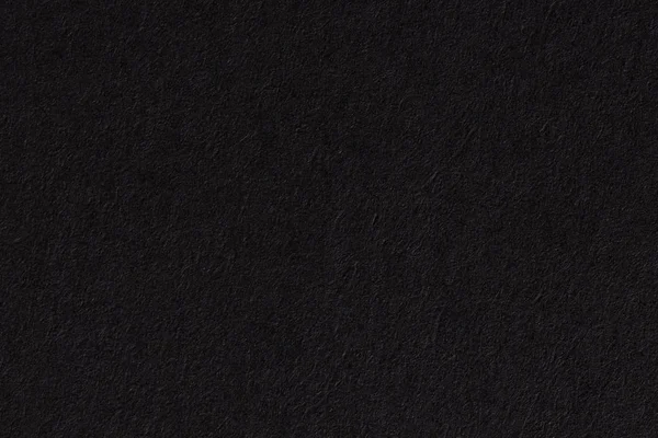 Hintergrund aus schwarzer Papierstruktur. — Stockfoto