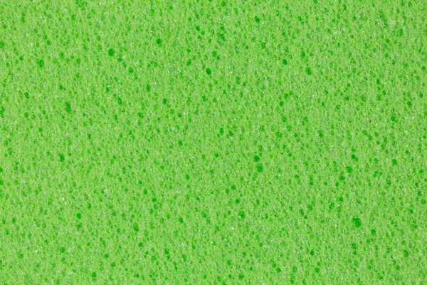 Lime green foam (EVA) texture with uneven surface.