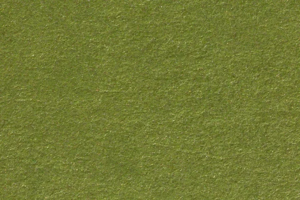 Vintage green paper background, close up.