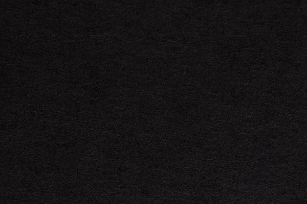 Zwarte donkere achtergrond van textuur. — Stockfoto