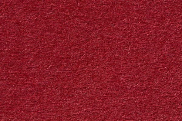 Triturado fondo rojo altamente texturizado para Navidad. — Foto de Stock