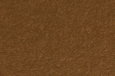 Kahverengi tonu kağıt soyut doku arka planını yakın çekim.