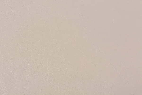 Beige leather texture close up. Can be used as background in art or design projects. — ストック写真