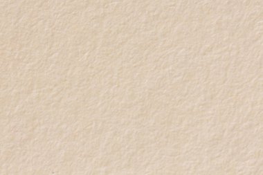 Kahverengi arka plan, açık bej kağıt dokusu, makro çekim.