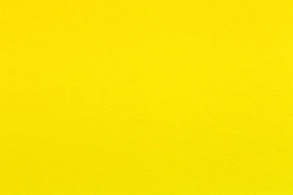 Papel amarelo ou gesso. Folha brilhante para fundo . — Fotografia de Stock