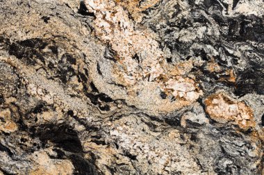 Bej granit arkaplanı kapatın. Yüksek kalite doku.