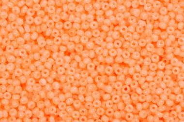 Açık turuncu cam boncuklar. Lüks tasarımınız için doku.