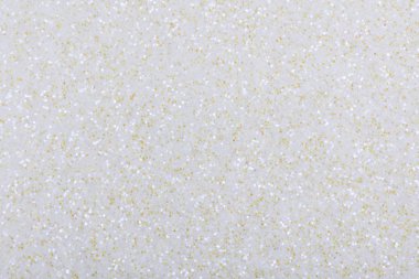 Zarif tasarımının bir parçası olarak, hafif ışık tonunda holografik parıltı dokusu.