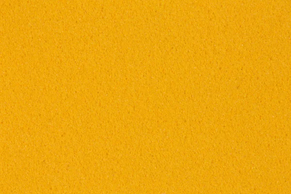 Klasyczna żółta pianka Eva tekstura z prostą powierzchnią. — Zdjęcie stockowe