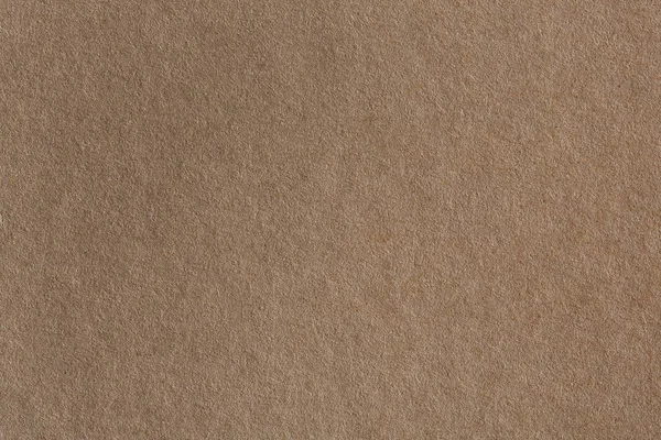 Fundo feito de um closeup de papel marrom. Pode ser usado como textura em projetos de arte . — Fotografia de Stock