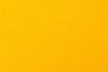 Parlak sarı keçe kumaş yakın çekim.