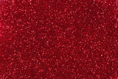 Red glitter Christmas background. High quality texture.