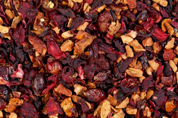 Fruit tea,Ingredients: Apple pieces, hibiscus, rose hips, elderb — Stock Photo, Image