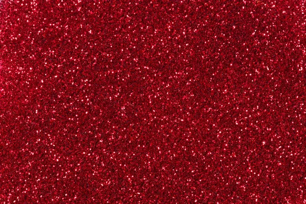 Red glitter Christmas background. High quality texture.