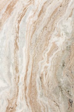 Light beige brown quartzite stone texture close up.