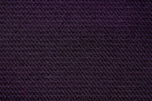 Sötét szövet textúra lila tónusban. Felülmúlhatatlan sötét bőr textúra. — Stock Fotó